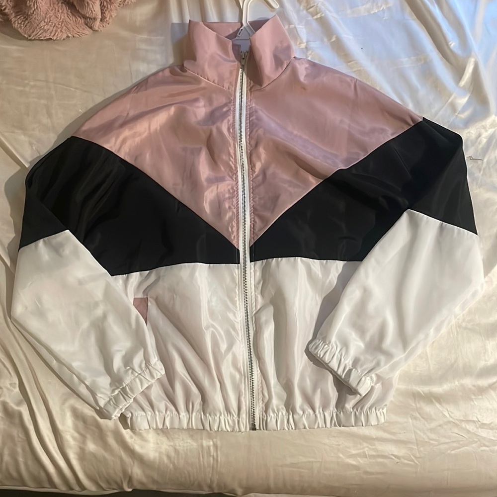 Never worn…at all! Decent sized pockets. White, black, and pink. And so cute!!!!